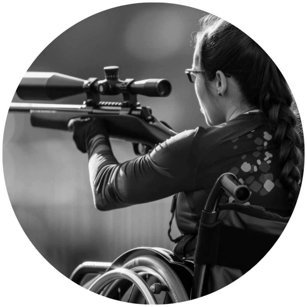  on aperçoit une femme qui pratique le tir sportif dans le pavillon pour les J.O 